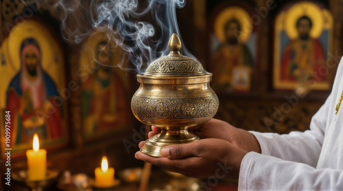 Brass incense burner releasing fragrant smoke in soft light