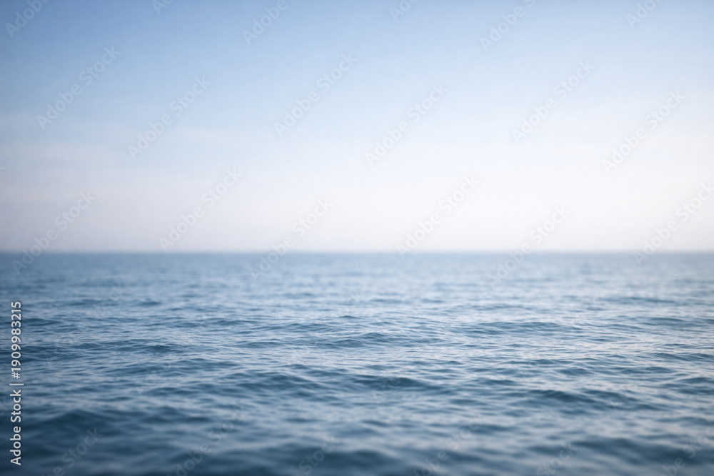 Obraz premium AI generated calm empty sea with distant horizon conveying solitude loss and quiet reflection soft natural light smooth water texture minimal composition with wide copy space