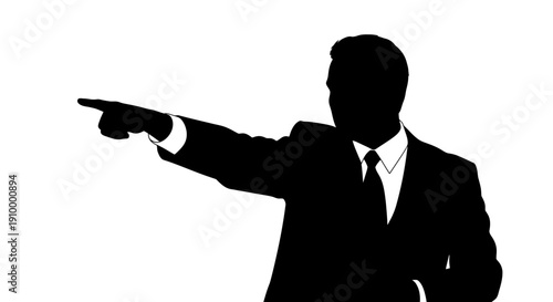 Silhouette of Businessman Pointing Left.