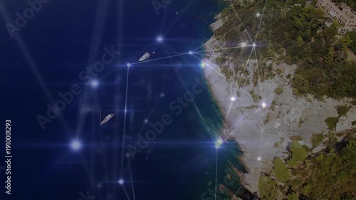 Camera moving over bay, motion starting net overlay pulsing, nodes anchoring shore, showing links