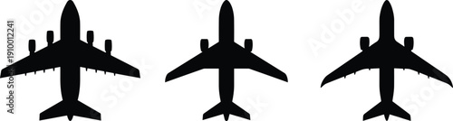Airplane silhouettes set viewed from top isolated on white background representing commercial aviation, air travel, passenger aircraft, transportation industry, and flight illustration concept