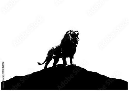 岩の上に立つライオンシルエット