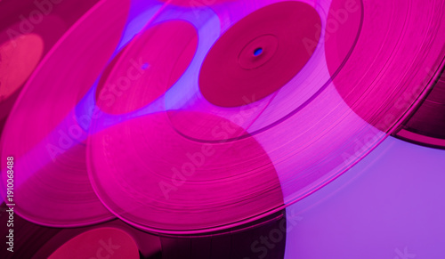 Canvas Print Colorful musical abstract background with close-up of vinyl records with texture