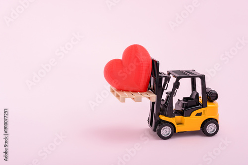 Toy forklift with red heart