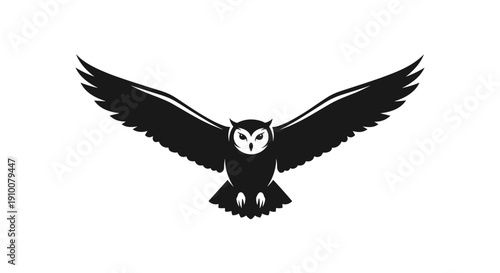 Black Owl Flying with Outstretched Wings.