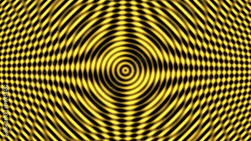 Optical illusion of yellow and black concentric circles creating a spiral effect.