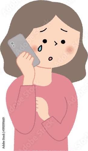 泣きながらスマホで相談する女性