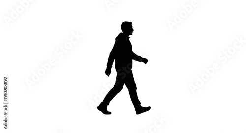 Silhouette of a man walking forward in a confident stride.