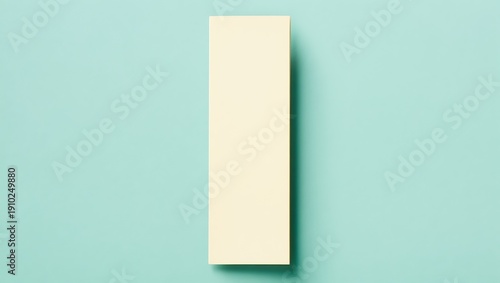 Mockup of a bookmark with a blank page on a flat surface