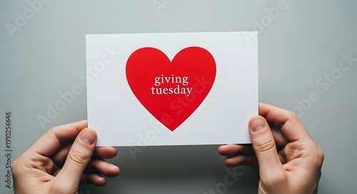 heart in hand, Hands Holding White Giving Tuesday Card with Red Heart for Charity and Donation Concept