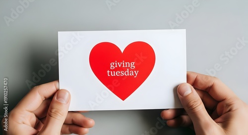 heart in hand, Hands Holding White Giving Tuesday Card with Red Heart for Charity and Donation Concept