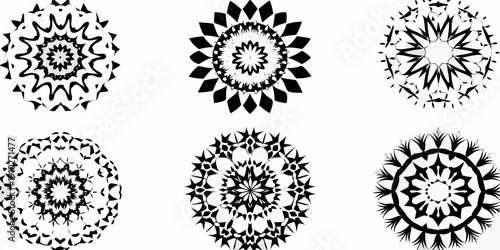 Six black and white circular floral or starburst like designs arranged on a white background