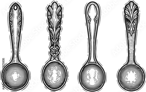 Vintage ornate spoons set with intricate decorative handles in black and white engraved design