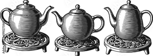 vintage teapots on ornate stands classic kitchenware set with intricate detailing and elegant shapes