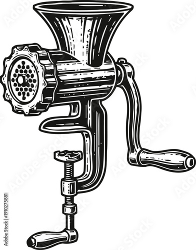 Vintage manual meat grinder with clamp and rotating handle for kitchen food preparation