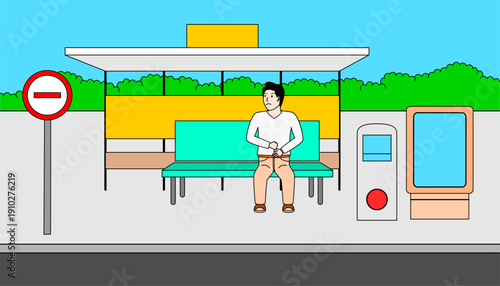 Man is sitting on a bus stop. The bench is located on a sidewalk next to a street