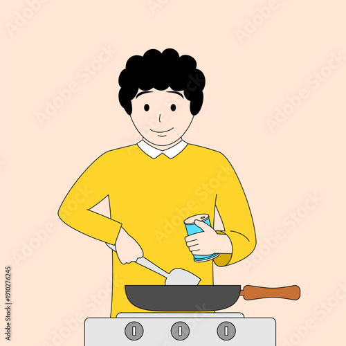 Man in a yellow shirt is cooking food in a pan