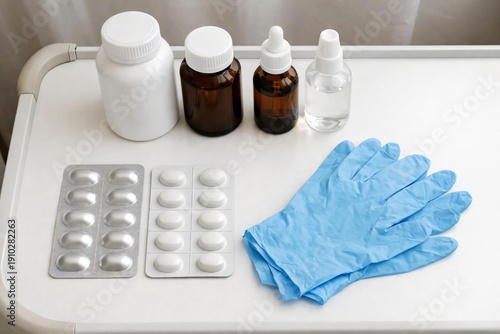 Hospital Bedside Table with Medicine Bottles. hospital tray with unbranded medicine containers, capsules. hospital bedside table with neatly arranged medicine bottles. 