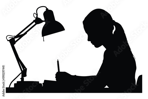 Silhouette of girl studying at desk with lamp