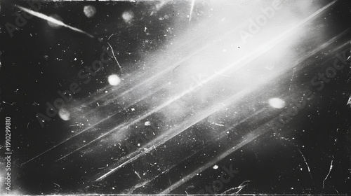 retro film overlay effect with scratch dust and bokeh light leaks,retro grain noisy film distressed light leak flare on black background,black and white abstract background,Abstract old film texture