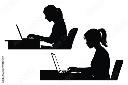 Two women working on laptops at desks silhouette