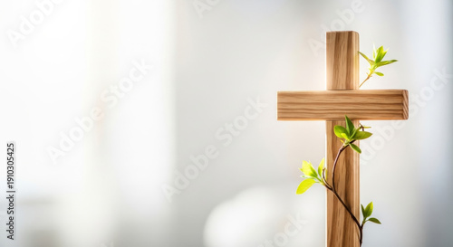 Lent light on cross wooden cross illuminated by soft sunlight symbolizing hope and spiritual renewal. Image can be used for church publications, devotional materials, or Easter preparation themes.