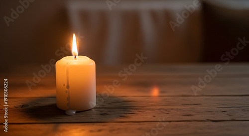 Wallpaper Mural Lit Candle on Wooden Table in Dark Room. Torontodigital.ca