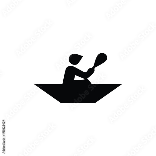 Black silhouette of a person kayaking with a paddle