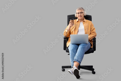Female programmer with coff...