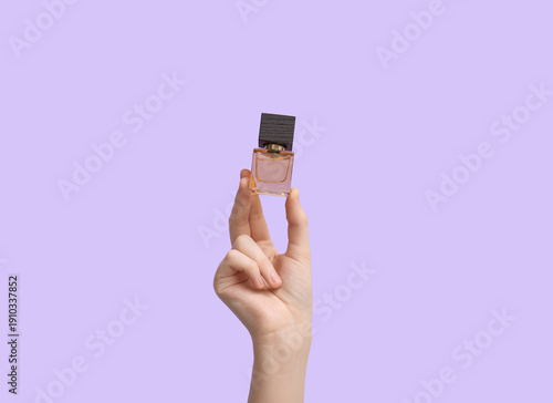 Female hand with bottle of ...