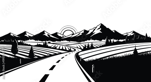 A winding road leads towards distant mountains under a rising sun