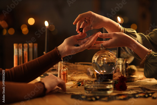Fortune teller reading woma...