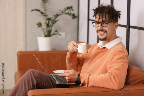 Young male bank manager wit...