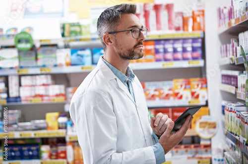 Tableau sur toile Pharmacist, man or inventory inspection with tablet for online order, prescription or product info