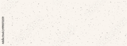 Rice textured craft vintage gritty paper. Beige with small noise and dots in ecru color. Paper with specks, flecks background. Organic recycle material effect. Scrapbook blank. 