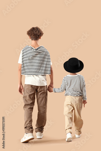 Cute brothers walking and h...