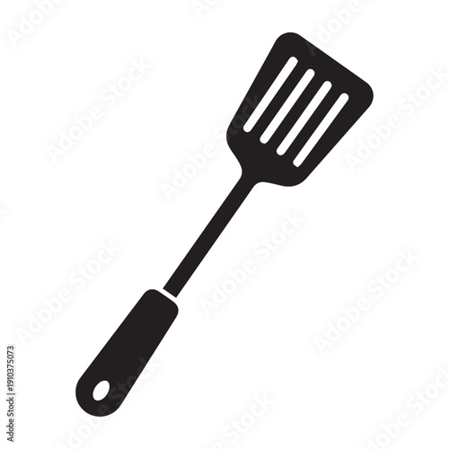 Black Slotted Spatula Kitchen Utensil for Cooking and Grilling, Isolated on White