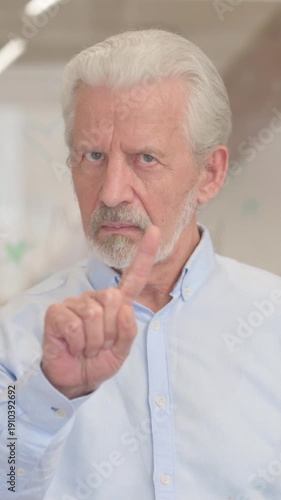 Wallpaper Mural Portrait of Old Man with Thumbs Down, vertical video Torontodigital.ca