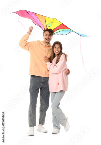 Happy young couple flying c...