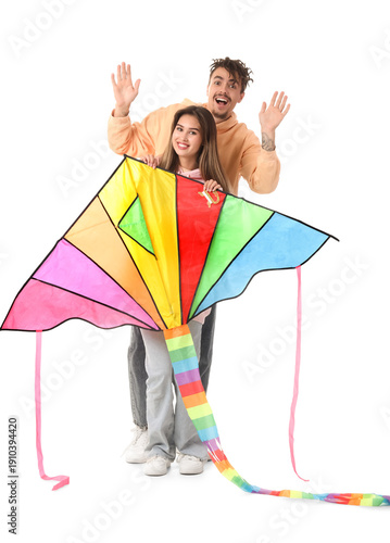 Happy young couple with col...