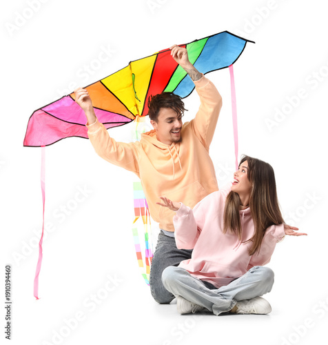 Happy young couple with col...