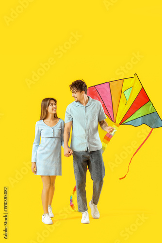 Happy young couple flying c...