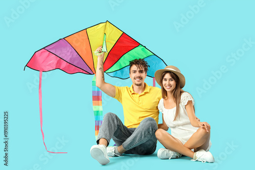Happy young couple with col...