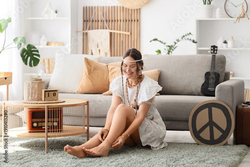 Young happy female hippie w...