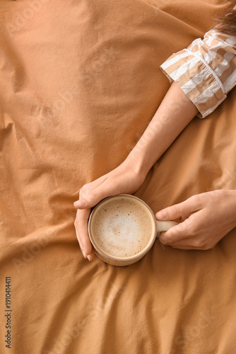 Young woman with cup of cof...