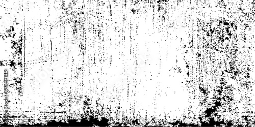 Abstract grunge background with dark ink splatters and a dirty paint texture featuring a black spray pattern and a vector art border design on paper