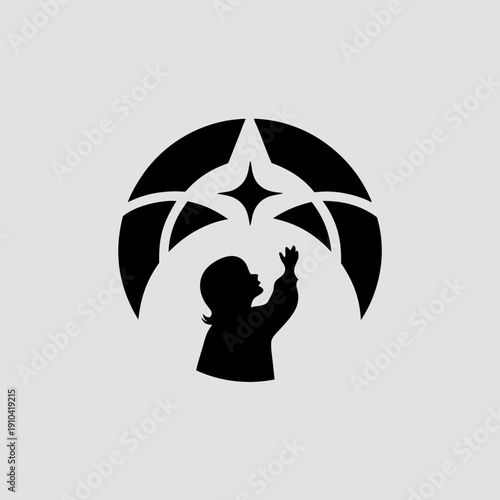 Silhouette of a child reaching up towards a stylized star