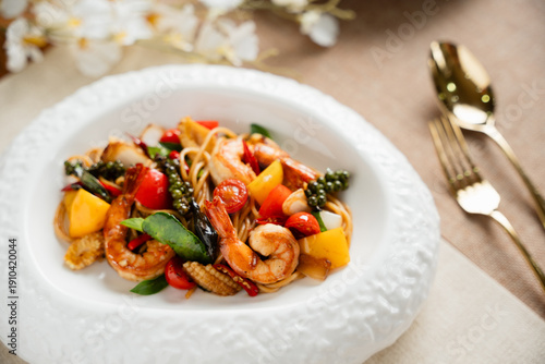 Wallpaper Mural Delicious Shrimp Pasta Dish with Colorful Vegetables on Elegant Plate Decorated with Flowers Torontodigital.ca