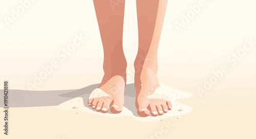 Bare feet stand in wet sand, with small pebbles scattered around them