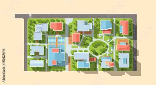 Aerial view of a residential complex with buildings, roads, and green spaces